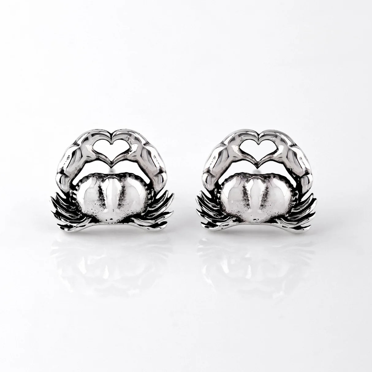 Crab Romance studs in Sterling Silver
