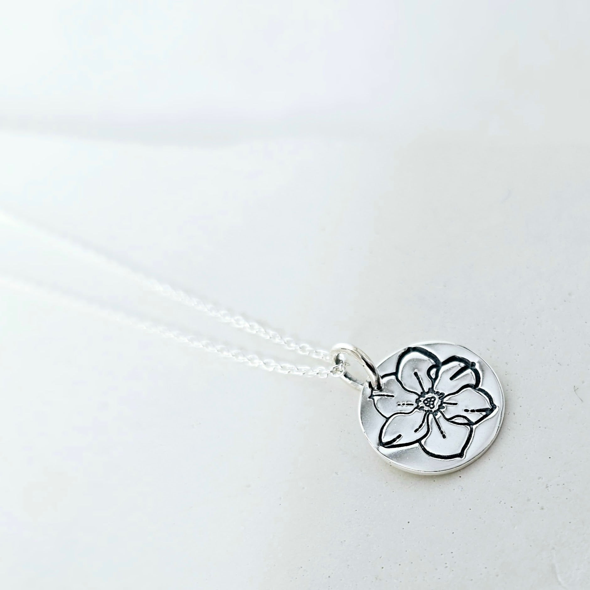 Celebrate Their Story: December - The Birth Flower Pendant