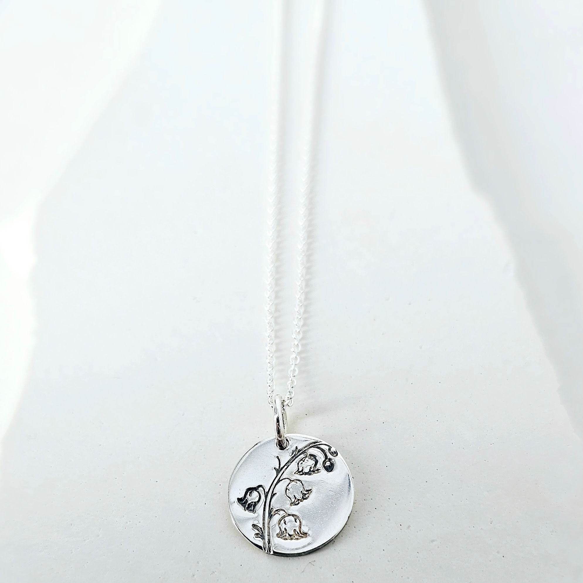 Celebrate Their Story: May - The Birth Flower Pendant