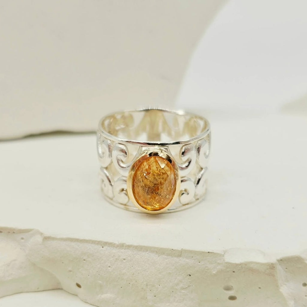 Koru Design Ring with Topaz