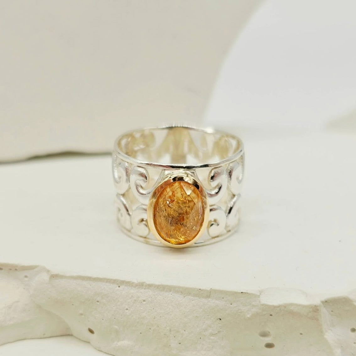 Koru Design Ring with Topaz