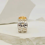 Koru Design Ring with Topaz