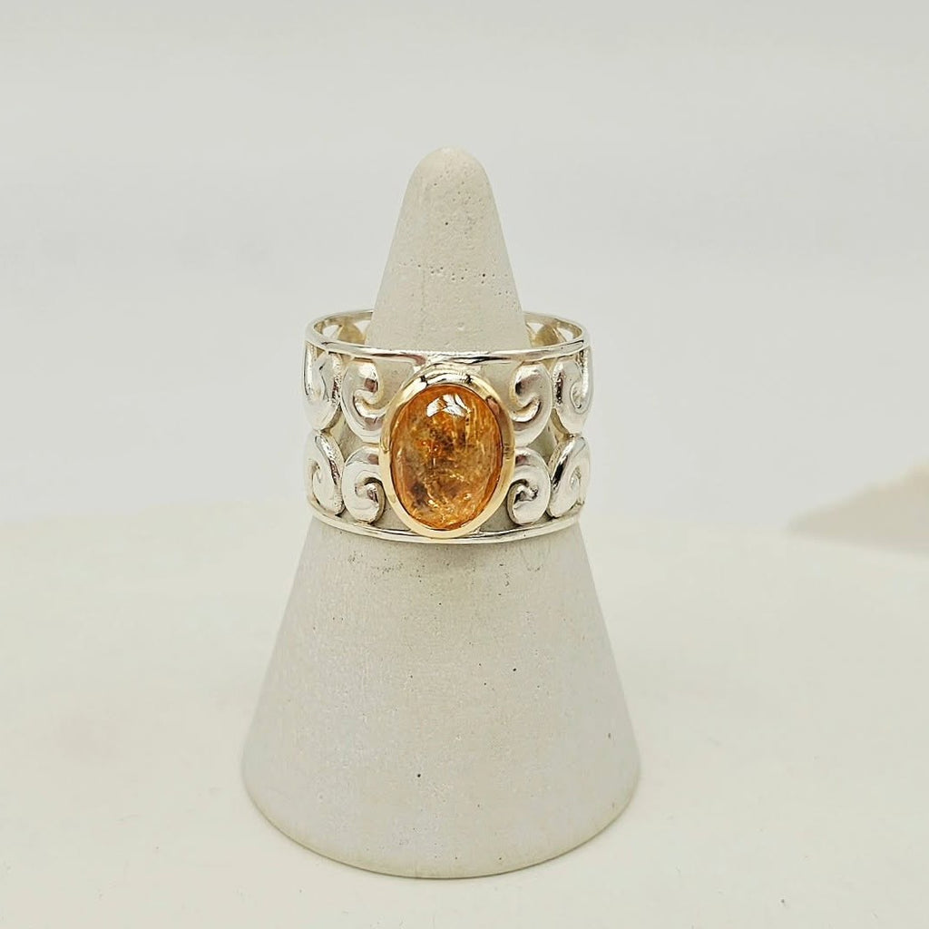 Koru Design Ring with Topaz