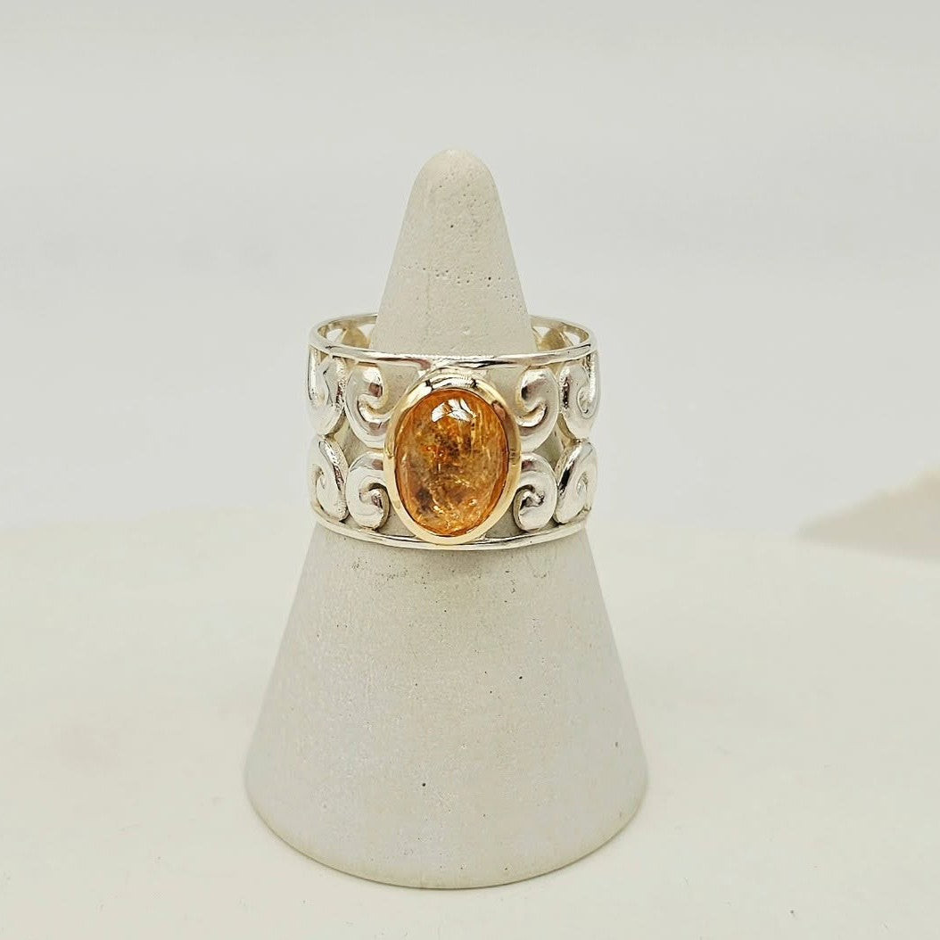 Koru Design Ring with Topaz