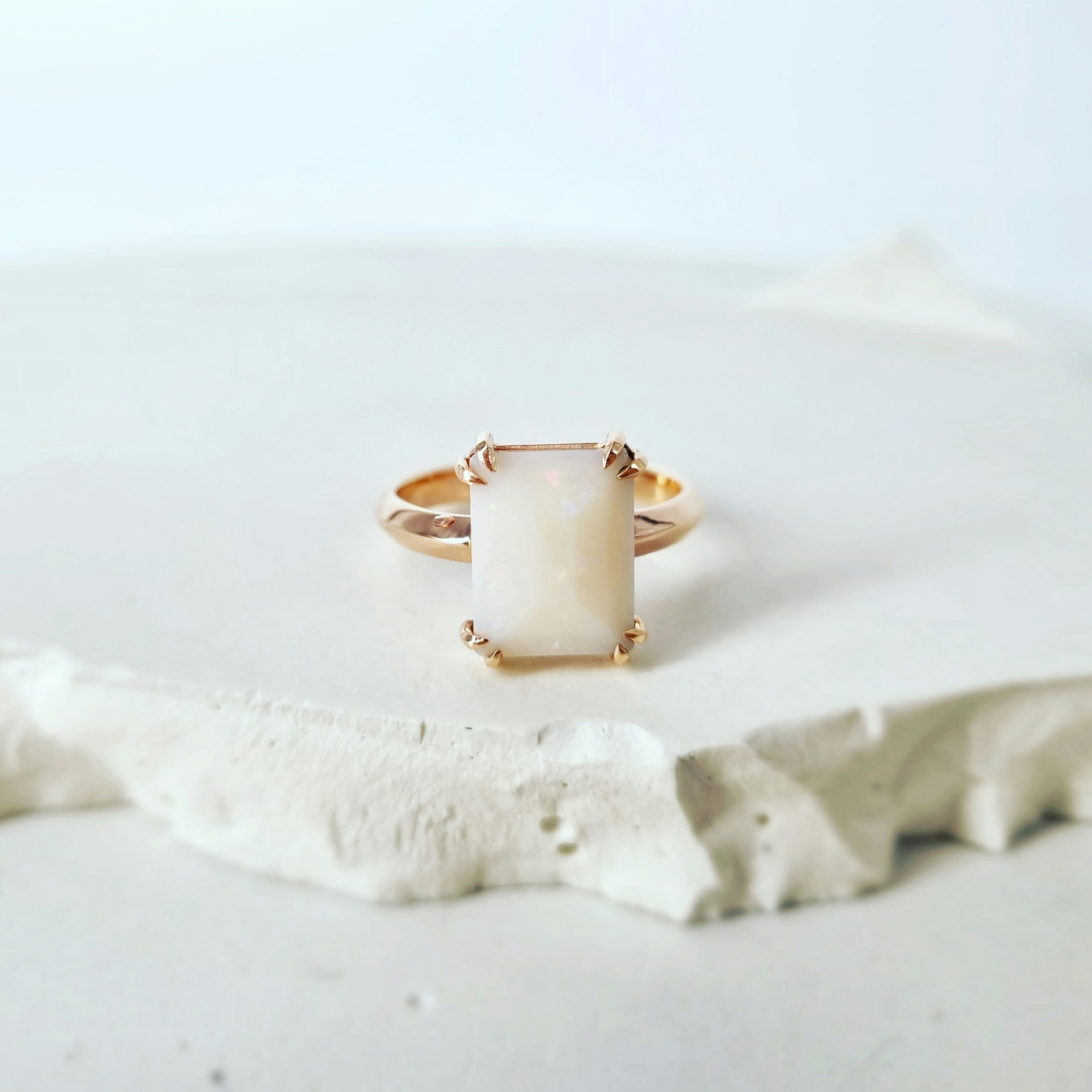 Embrace Bespoke Beauty: The Milky White Opal Talon Ring