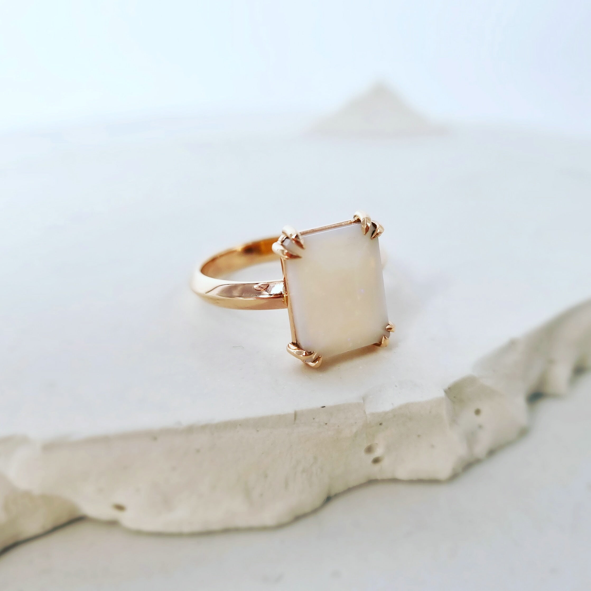 Embrace Bespoke Beauty: The Milky White Opal Talon Ring