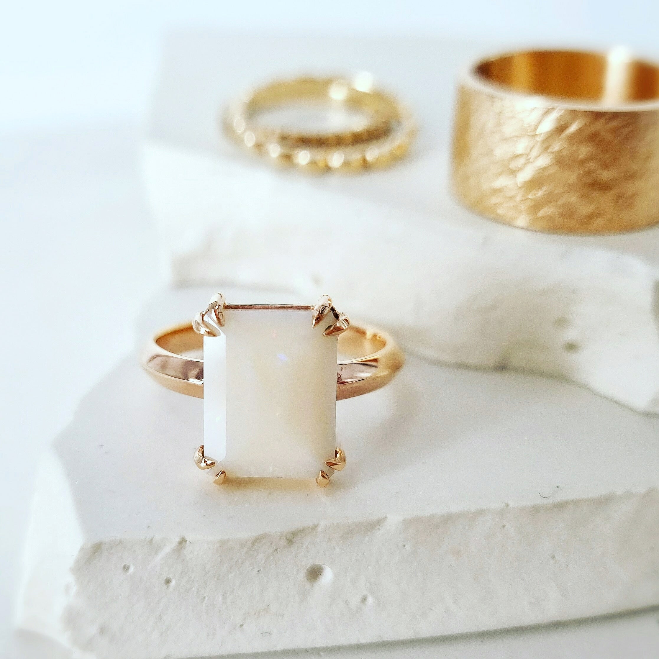 Embrace Bespoke Beauty: The Milky White Opal Talon Ring