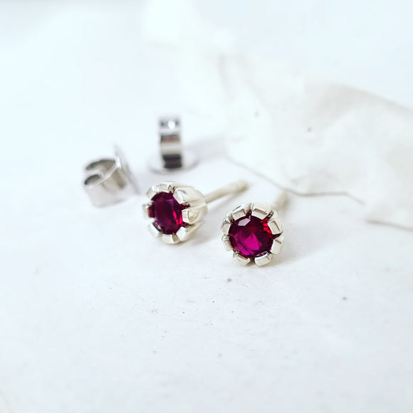 Ruby Studs in White Gold