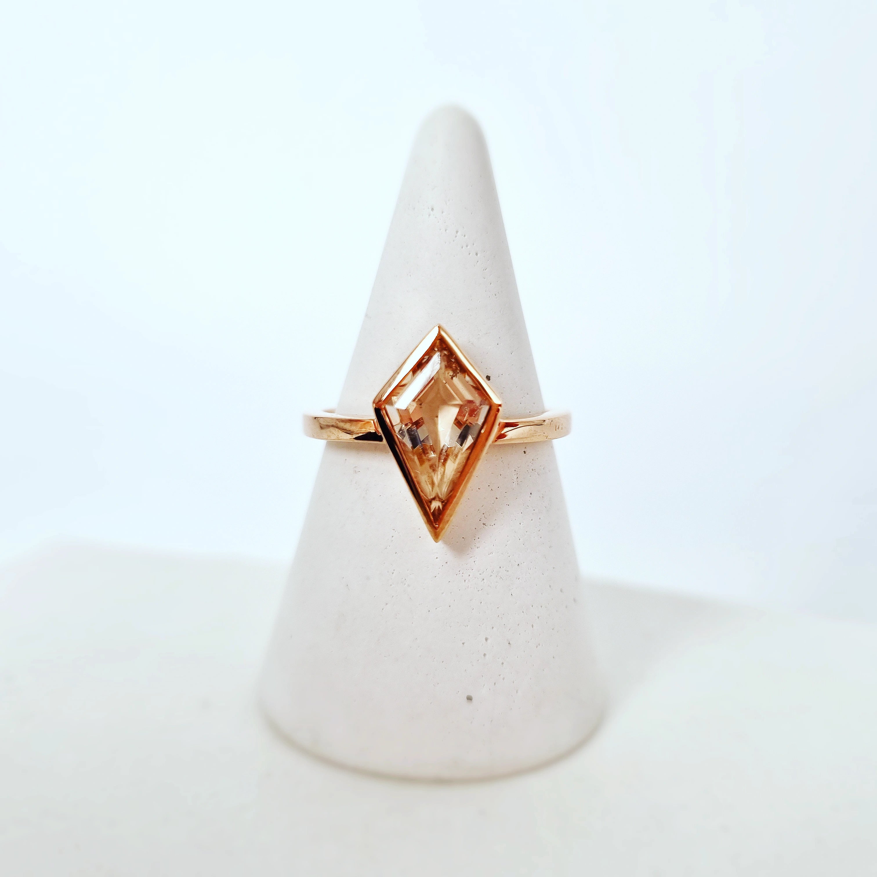 Discover Modern Radiance: The Peach Morganite Kite Ring