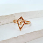 Discover Modern Radiance: The Peach Morganite Kite Ring