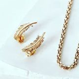 Feather Earrings in Red Gold